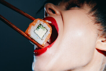 Bold sushi indulgence with vibrant colors and striking lips, highlighting a woman excitedly...