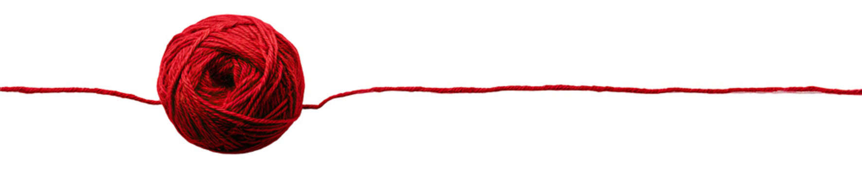 A ball of vibrant red yarn with threads extending outward against a black background