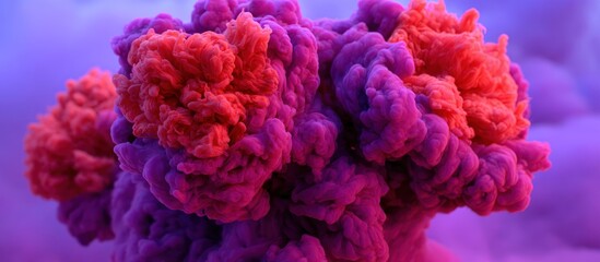 Obraz premium An abstract, close-up view of vibrant, billowing cloud-like forms in shades of purple and red