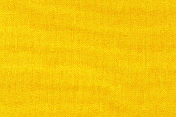 Yellow fabric cloth texture for background, natural textile pattern.