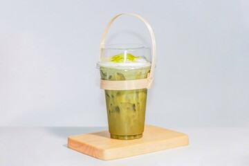 Ice Matcha green tea put on sack looks delicious and good taste.