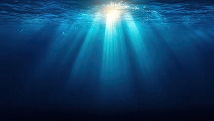 Obraz premium Submerged depths reveal vibrant blues, illuminated by sunbeams piercing the water's surface.