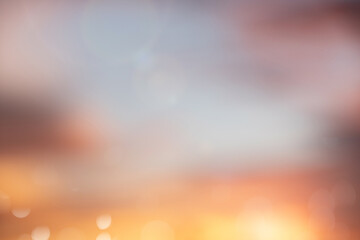 Abstract blurred sunset sky with soft orange, yellow, and blue pastel tones. Ideal for minimalist backgrounds, website design, presentations, and inspirational creative projects. evening gradient