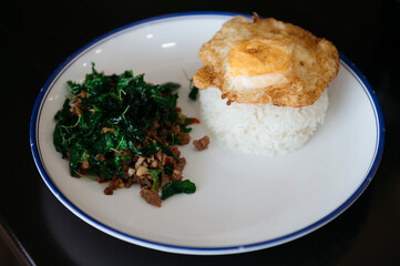 Thai basil stir-fried beef with rice and fried egg