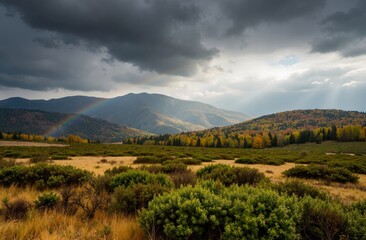 autumn landscape with mountains and clouds