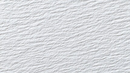 A close-up view of a textured white surface with subtle ridges and grooves, showcasing a smooth, even tone across the entire image.