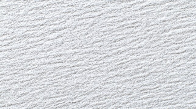 A close-up view of a textured white surface with subtle ridges and grooves, showcasing a smooth, even tone across the entire image.