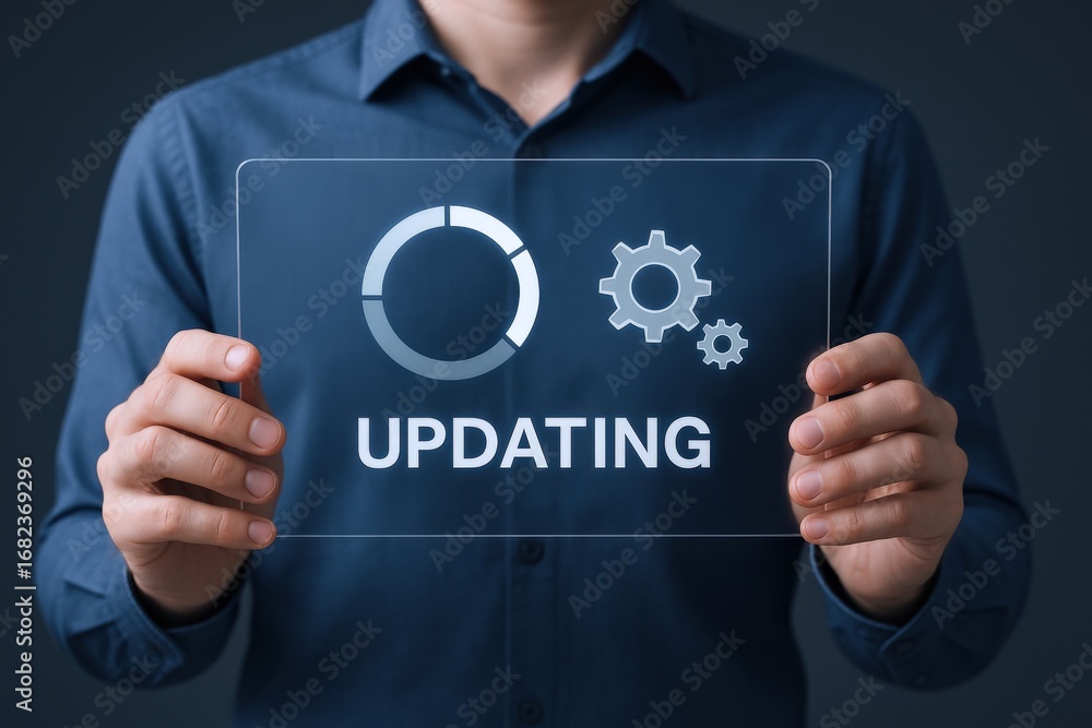 Poster person holding transparent screen displaying updating icon and text, illustrating digital technology
