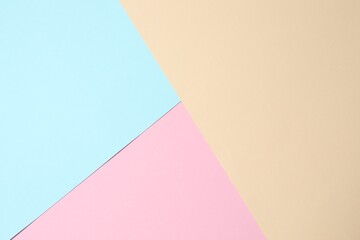 Pink, beige and blue color paper background