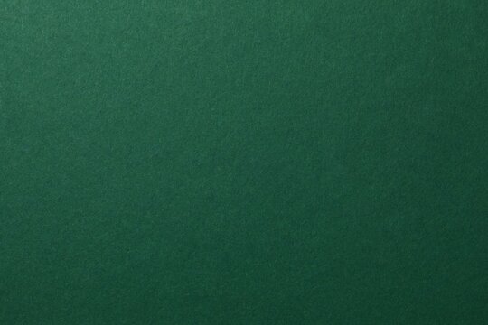 Green paper texture or background for design with copy space for text or image