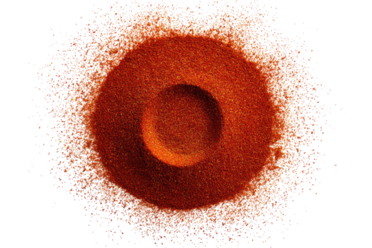 Circular, orange-brown structure surrounded by a scattering of small specks.  A dark void/hole in the center of the structure