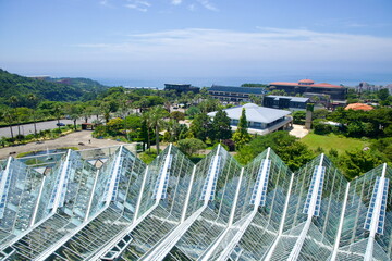 Sawtooth Roofs and Sea View