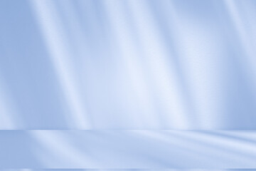 Wall interior background, studio and backdrops show products. with soft light shadow from window color blue and white. background for text insertion and presentation of product	