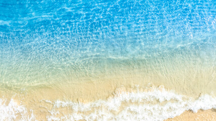 Nature of the ocean and blue sky Summer with sunshine, sandy beaches, clear blue waters sparkling against the blue sky. on an island with good ecology and environment Background for summer vacation