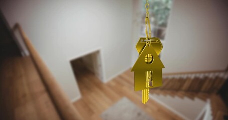 Animation of gold key and house key ring over blurred house interior - Powered by Adobe