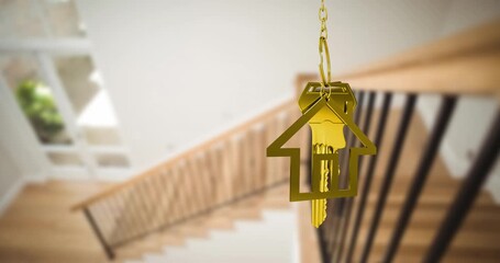 Animation of golden key with house shape over stairs in house - Powered by Adobe