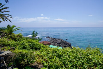 Jungmun Cliffs and Blue Water