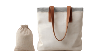 Off-white canvas tote bag with tan leather handles and a small beige drawstring bag