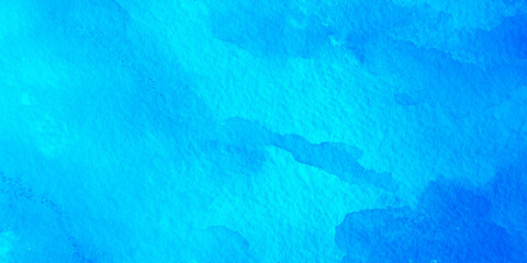 Abstract blue watercolor textured background with soft flowing artistic brush strokes, modern fluid paint pattern, creative artistic design, elegant decorative backdrop for contemporary digital.