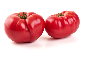 Two Heirloom Tomatoes, isolated on white background