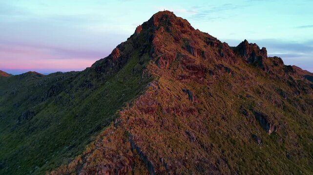 Landscape shot of the summit of Cerro Chirripo in Costa Rica surrounded by high-altitude paramo on a beautiful sunrise morning