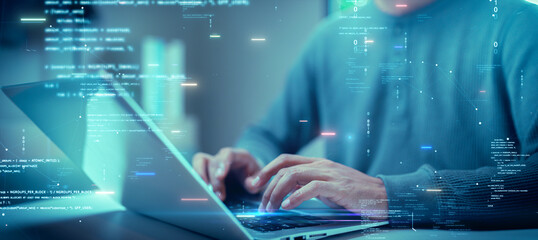 Close up of hands typing on a laptop with digital codes and futuristic data graphics overlay, symbolizing programming, cyber security, and technology innovation. Software Development.