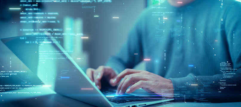 Close up of hands typing on a laptop with digital codes and futuristic data graphics overlay, symbolizing programming, cyber security, and technology innovation. Software Development. - Powered by Adobe