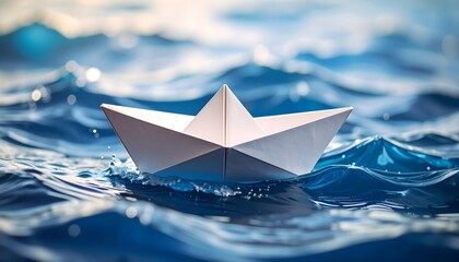 Obraz premium paper boat floating in the sea