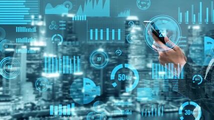 A futuristic scene showcasing a businesswoman using a smartphone against a vibrant urban backdrop, with digital data visualizations highlighting business analytics and trends. Xenic - Powered by Adobe