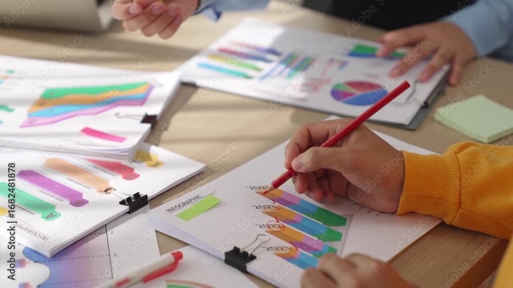 Poster startup company employee work together, analyze colorful bi dashboard paper with financial data repo