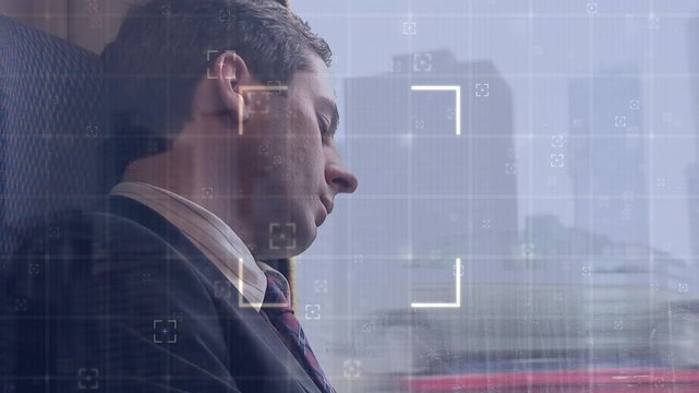 Animation of data processing over caucasian businessman in bus