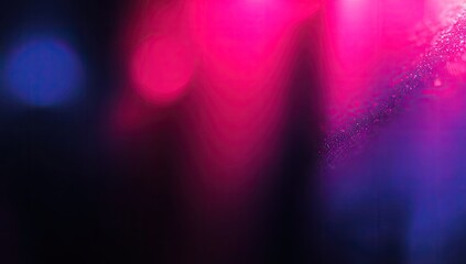 Vibrant abstract design featuring a blend of intense pink and blue hues, with soft bokeh effects, creating a dynamic and captivating visual.