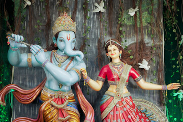 Ganesh as Krishna with Radha, Creative Ganesha playing flute, Artistic Ganpati and Radha idol,...