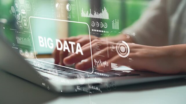 Professional Hands Typing on Laptop with Big Data Graphics and Digital Elements Representing Technology and Information Analysis. Asymptotic smart data analytic.
