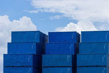 Cargo container stack pile on blue sky background, Global business logistic import export cargo...
