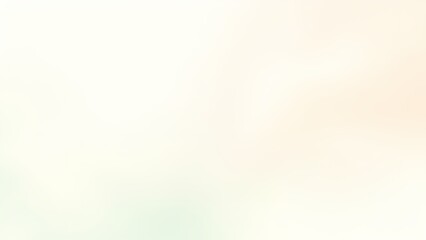 淡いグリーンとオレンジの柔らかな光の抽象背景