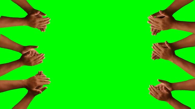 Applause effect with hands clapping on a green screen background. Concept of victory and awards with copy space.