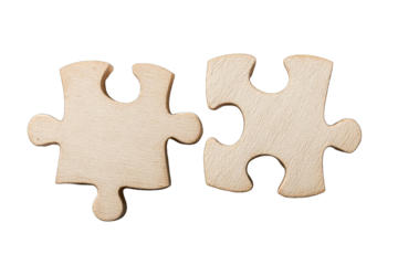 Two light beige wooden puzzle pieces, meeting but not quite connected