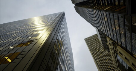 Naklejka premium Looking up at towering skyscrapers gleaming under a dull sky, glass reflects faint light as urban energy pulses below in a vibrant city filled with life and activity.