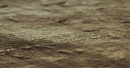 Close up view of a brown surface showcasing intricate patterns and textures. The surface reveals a unique interplay of light and shadow, creating an interesting visual effect.