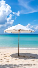 White umbrella on a pristine beach