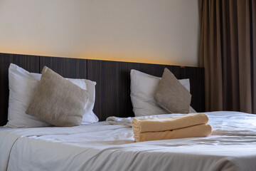 Comfortable hotel mattress with crisp white bedding symbolizing cleanliness and relaxation