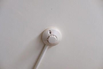 Modern fire sprinkler system mounted on white ceiling ensuring safety in commercial building