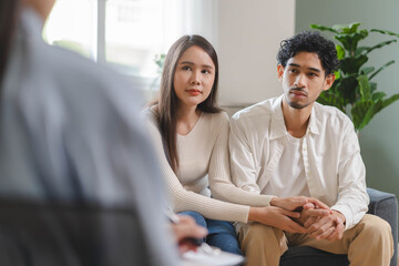 Spouses relationship consultant concept, Married couple listen to psychologist  during therapy talk...
