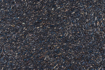 Dark wood chips mulch texture