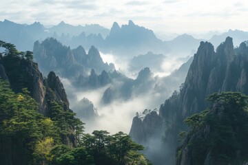Layers of misty Chinese mountains at sunrise
