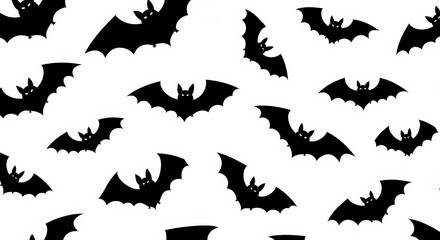 Fototapeta premium Flying Black Bat Silhouettes in a Spooky Halloween Pattern Isolated on White