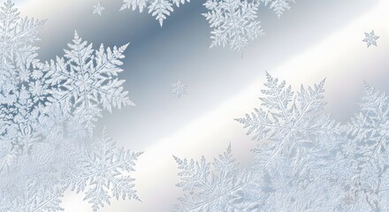 Elegant close up of delicate snowflakes falling on a softly lit winter background