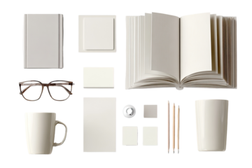 Flat lay of various stationery items.  Blank books, notebooks,  a mug, glasses,  and writing utensils displayed.  Clean, neutral palette