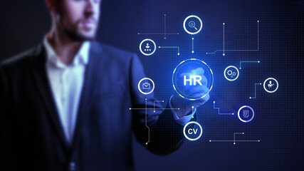 Professional engaged in human resources activities using digital technology to enhance recruitment and management processes